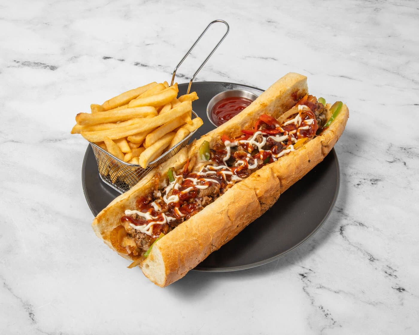 Philadelphia steak sandwich with fries